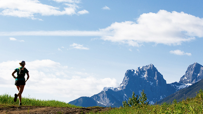 Image Of A Trail Runner In The Mountains Racing At Altitude