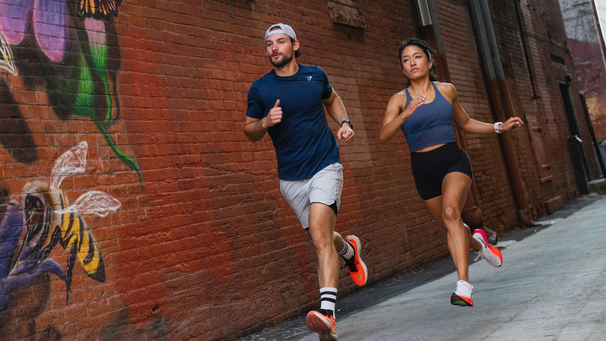 Two Runners Outside Training Running Economy And Leg Spring Stiffness