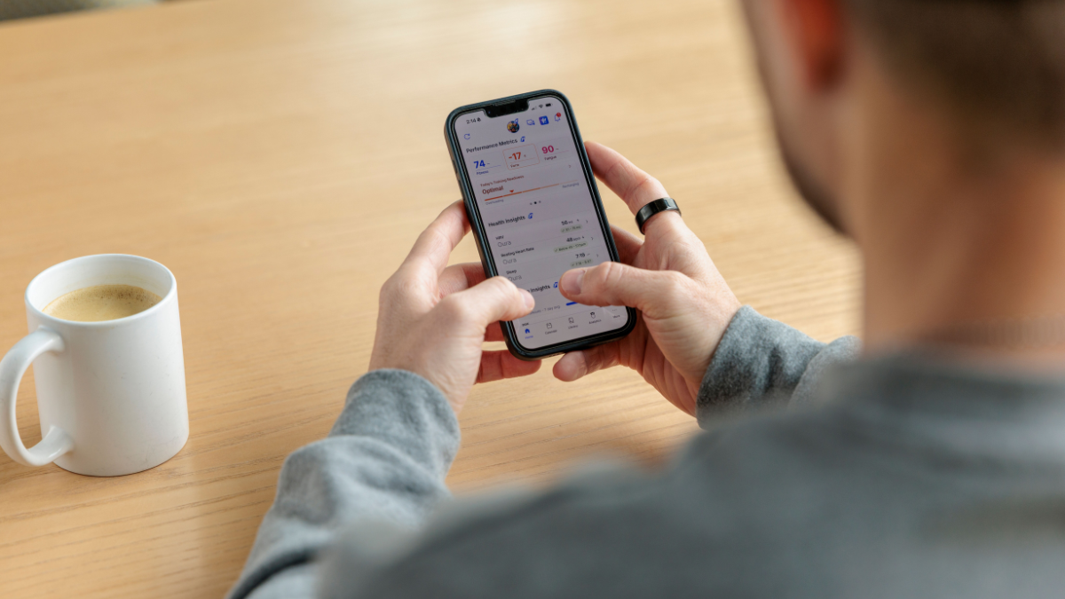 Athlete Looking At Oura Ring Health Insights In Trainingpeaks