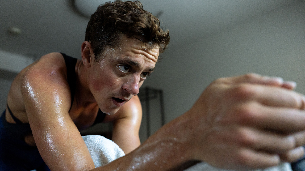 Why Do You Sweat More As You Gain Fitness Indoor Cyclist On Indoor Training Sweating Intensely