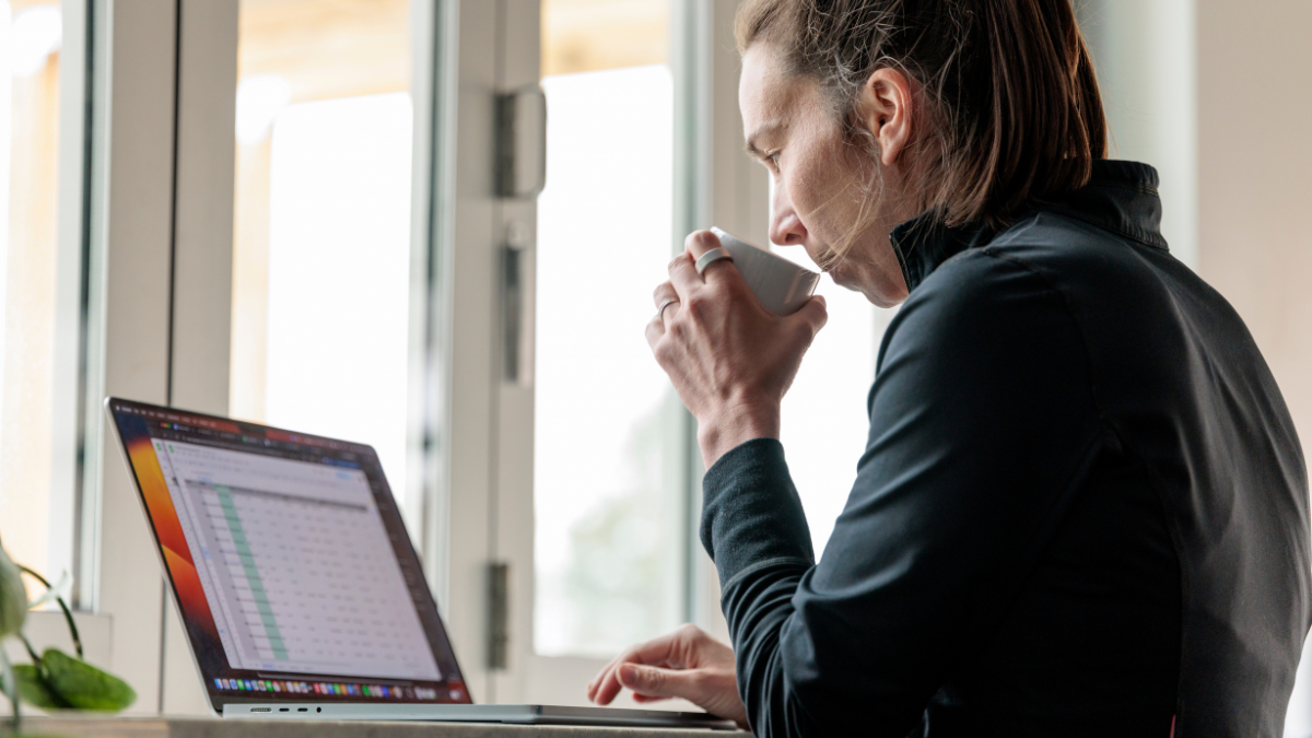 Coach At Laptop Managing Athletes With Trainingpeaks