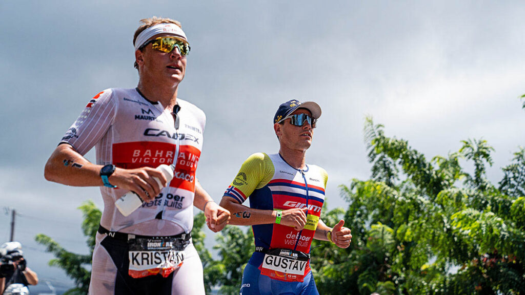 professional triathletes Kristian Blummenfelt And Gustav Iden run during the 2022 Ironman world championships in Kona