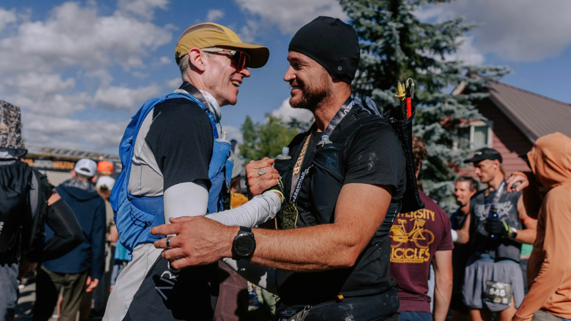 Boundless And Trainingpeaks Boundless Athlete And Coach Embracing With Happiness After A Race