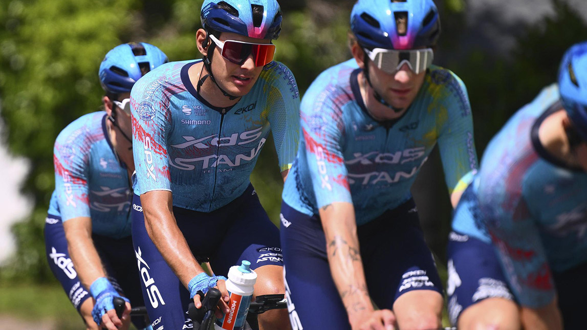 Male Professional Cyclist, Team Xds Astana, Riding Single File
