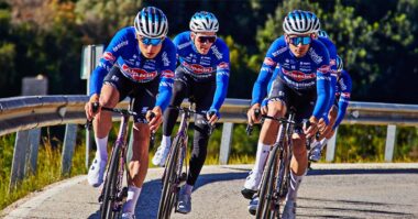 group of cyclists making a turn