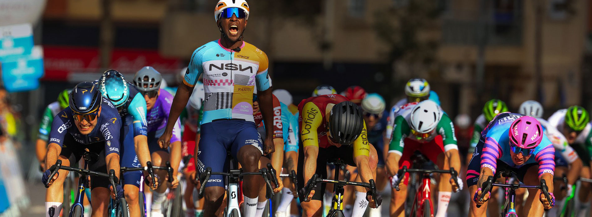 Trainingpeaks And Nsn Cycling Team – Sprintcyclingagency Male Cyclist Winning Sprint Finish In Bike Race Nsn Cycling Team Sprintcyclingagency Hero