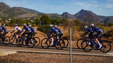 Professional Women's Cycling team riding through mountains