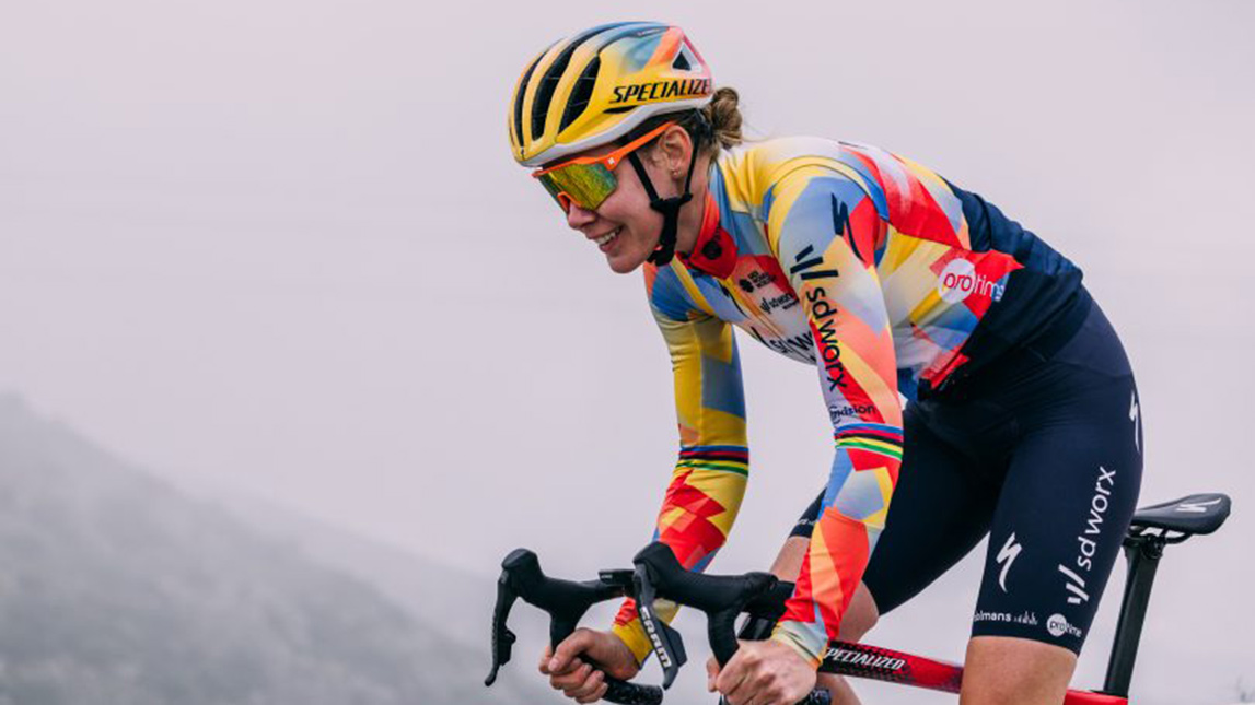Trainingpeaks And Team Sd Worx Protime Female Cyclist Riding Up Mountain Pass In Foggy Weather From Team Sd Worx Protime