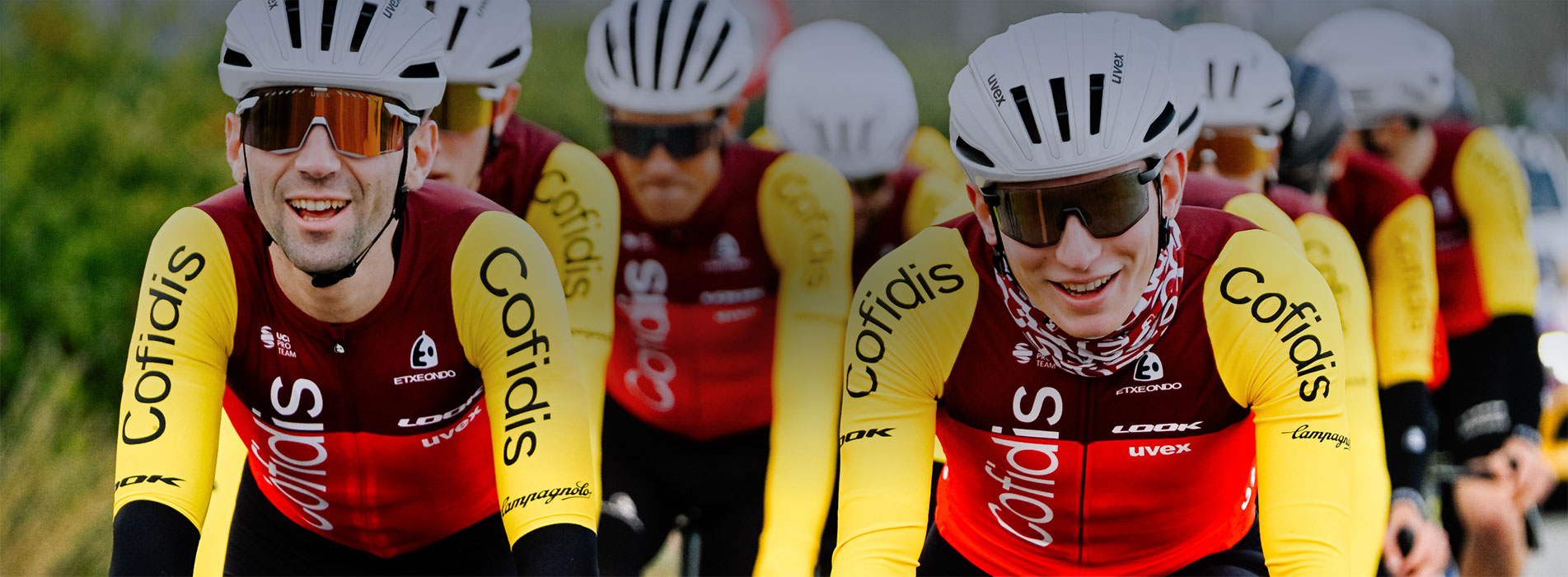 Trainingpeaks And Cofidis Male Professional Cyclists From Team Cofidis, Riding Together In Close Group