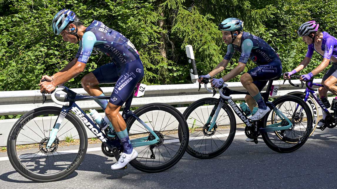 Professional Male Cyclists Racing Up Mountain Climb Team Bahrain Victorious Sprint Cycling Agency