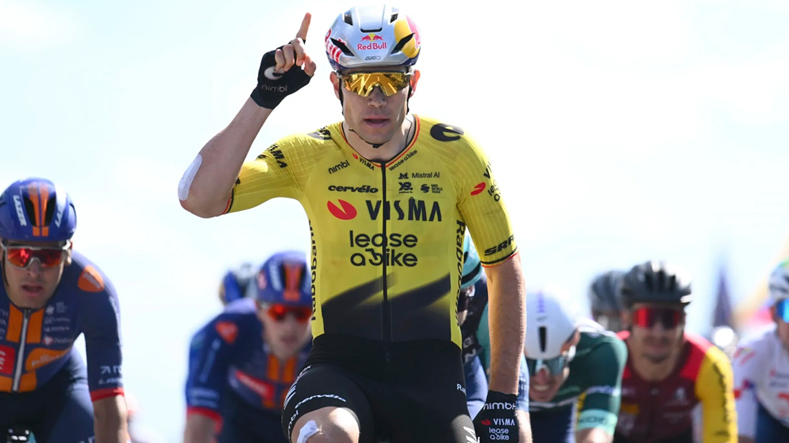 Trainingpeaks And Team Visma Lease A Bike Male Cyclist Crossing The Finish Line In 1st And Holding 1 Finger Up Team Visma Lease A Bike