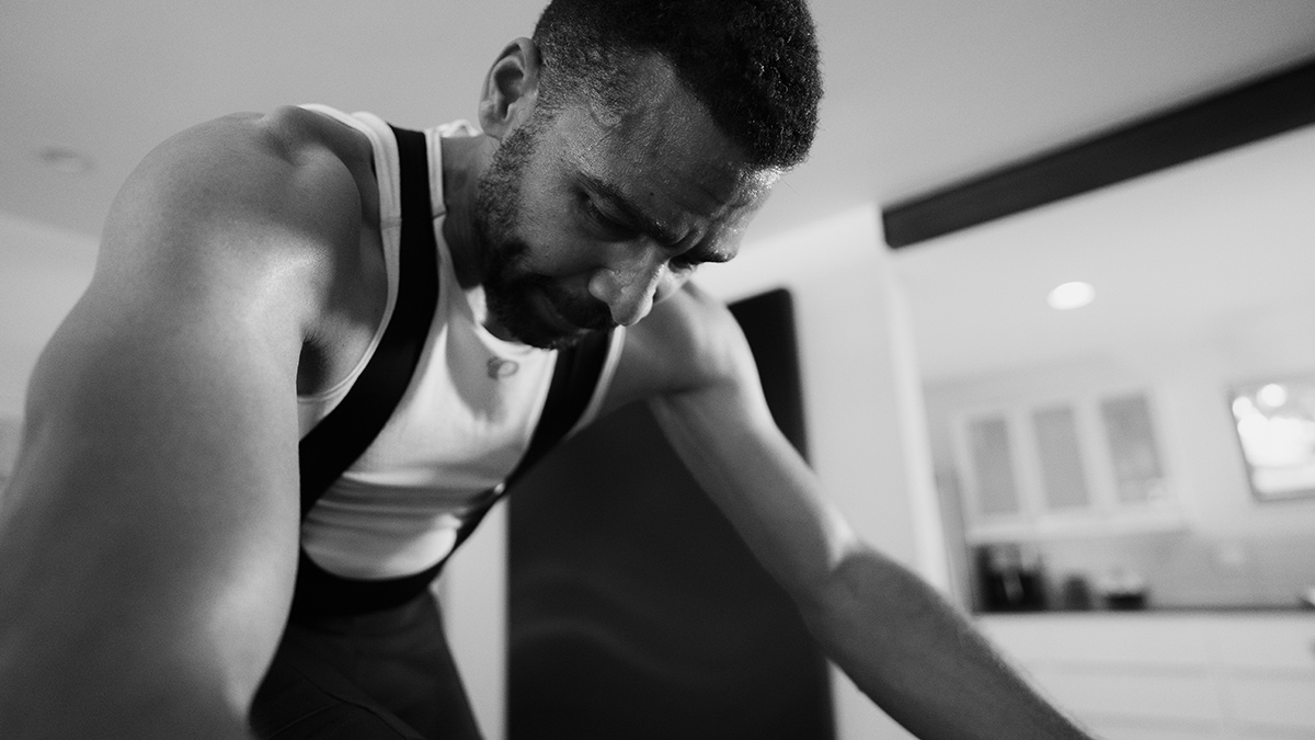 How Biomarker Testing Can Improve Performance Black And White Photo Of Male Cyclist On Indoor Trainer