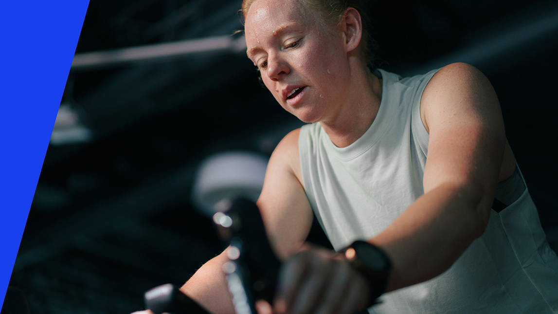 Female Cyclist Training On Indoor Bike Using Trainingpeaks