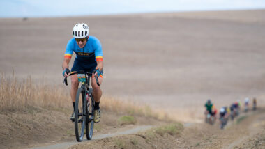 Male cyclist leading the pack in FOCO Fondo Gravel Race