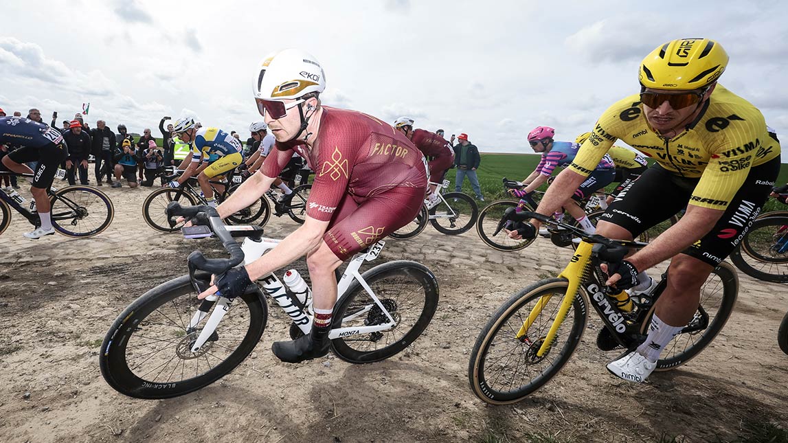 Modern Adventure Pro Cycling Team And Trainingpeaks Male Cyclist Racing Around Cobblestones Modern Adventure Pro Cycling Team Photo By Sprint Cycling Agency