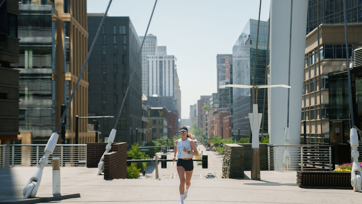How Poor Air Quality Affects Performance Woman Running Through Urban Area Affected By Poor Air Quality.