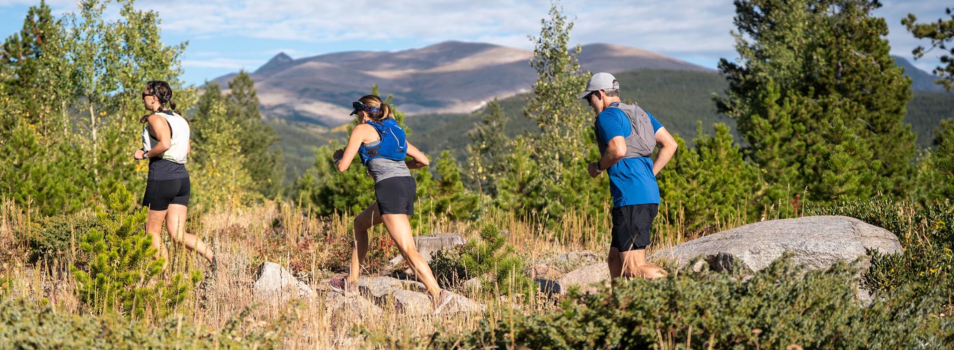 Ned Ned Trail Fest And Trainingpeaks 2 Females And 1 Male Runner Staggered Running On Trail At Ned Ned Trail Fest