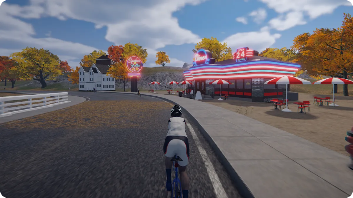 Trainingpeaks Virtual Cyclist Riding Along Roadside Near Diner