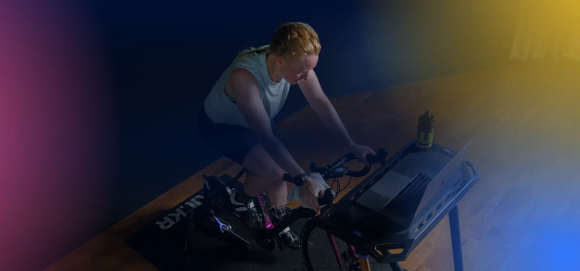 Cyclist Using Trainingpeaks Virtual On Laptop